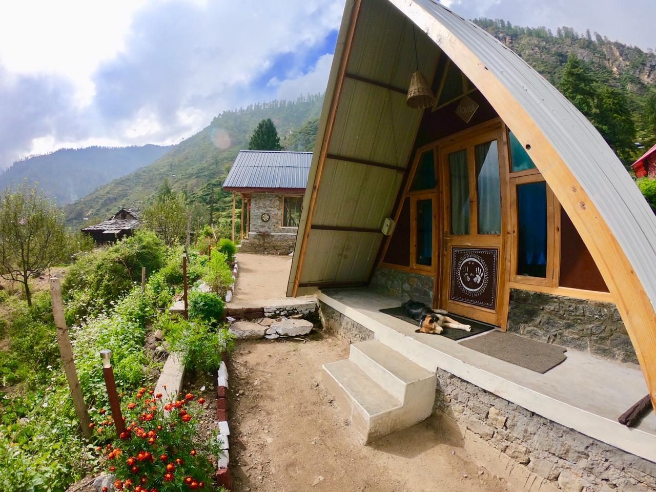 Clouds settling below a mountain property during monsoon season